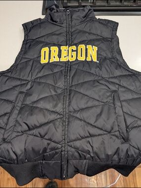 Colosseum brand OSU Puffer Vest in Black with Yellow Lettering